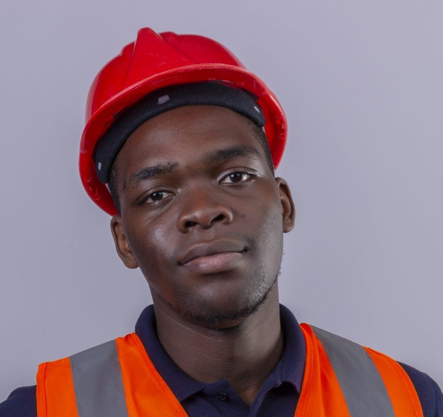 young african american builder man wearing construction vest and safety helmet holding clipboard looking confident standing over white background